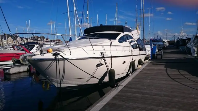Song and Dance moored on the pontoon at the marina